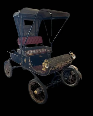Early open-top Oldsmobile automobile